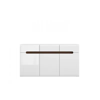 Шкаф AZTECA TRIO е елегантна бяла мебел за дневната или трапезарията. Разполага с три чекмеджета и три вратички с рафтове. Шкафът е част от серията мебели Azteca на полската марка BRW.