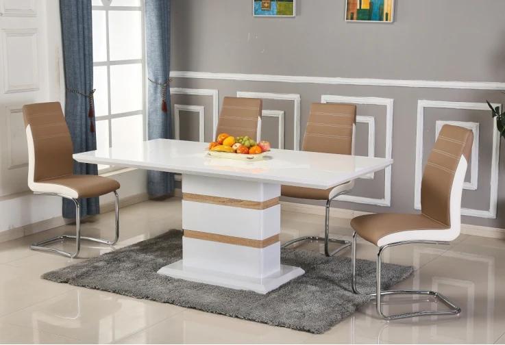 Фабиан е елегантна маса за трапезария с един масивен крак. Изработена е от МДФ бял лак с декорация дъб сонома.